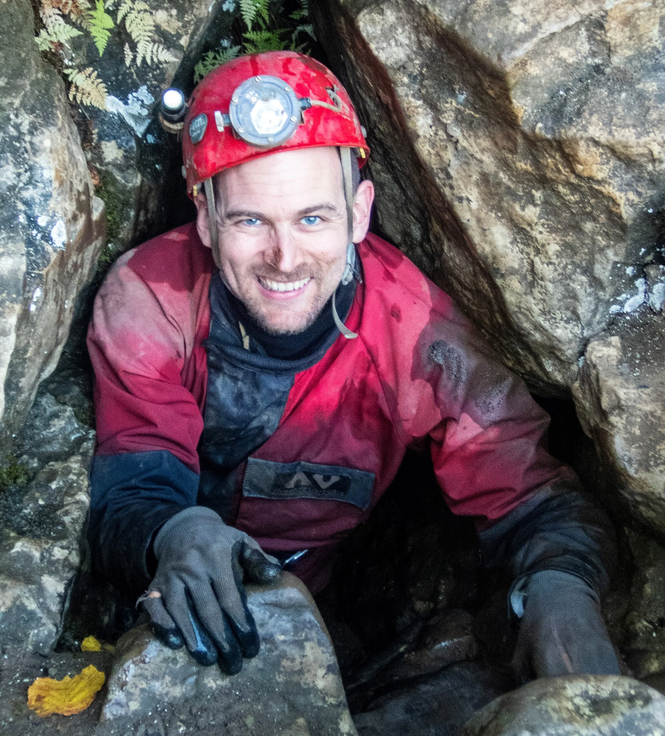 Brendan Sloan in caving equipment